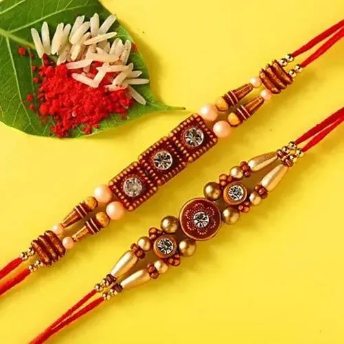 2 Stone Work Rakhis and Choco Swiss Jingles Box